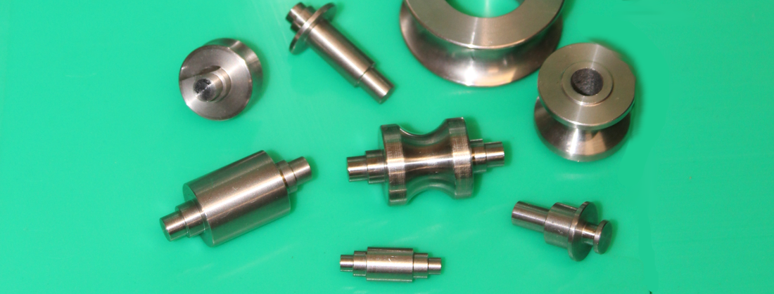 Precision engineering parts on bench